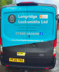 Rear View of Longbridge Locksmiths Ltd van sign written with locksmith company information and branding