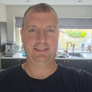 Chris Singleton owner of Longridge Locksmiths Ltd wearing black t shirt