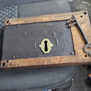 Old church rim lock opened, serviced and new warded key made. Lock and key laid on van seat