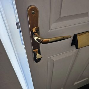 Thumb turn euro cylinder fitted to white composite door on HMO property in Burnley