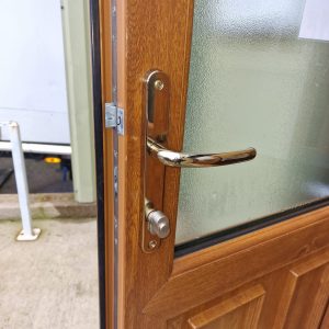 Satin silver thumbturn lock fiotted to brown upvc door in Burnley during upvc door lock repair